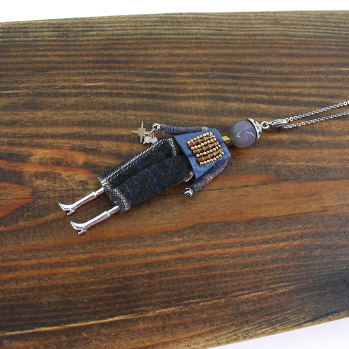 N23188C Stone Adorned French Doll Stainless Steel Necklace